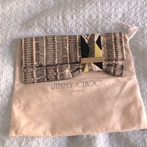 Jimmy choo snake embossed with crystal design clutch